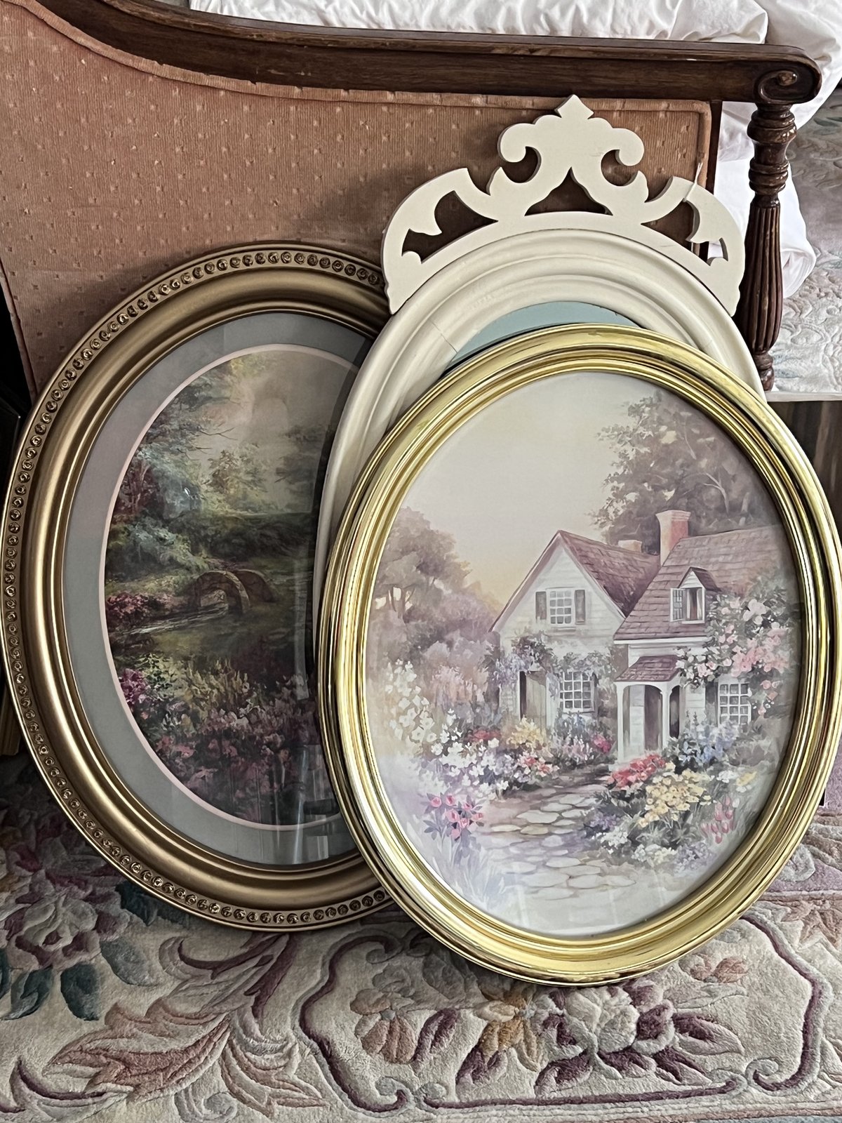 Pair of framed oval cottage garden prints