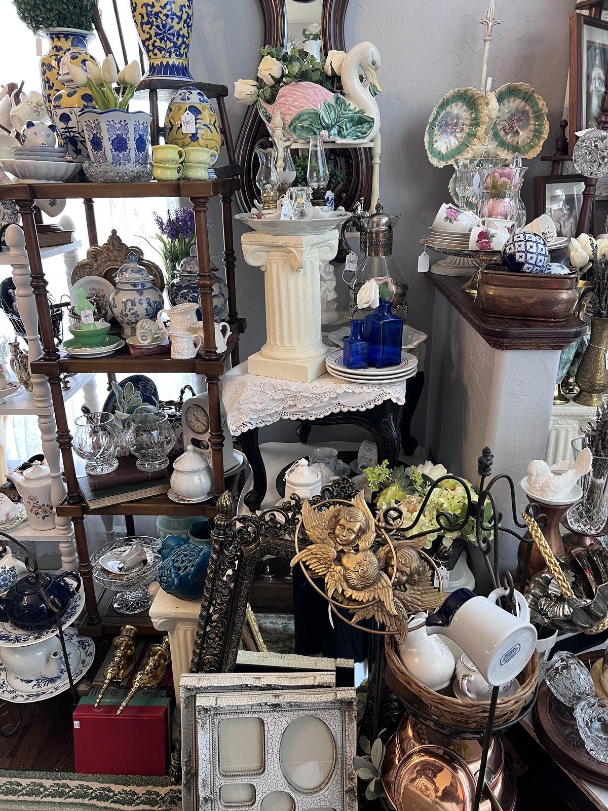 A curated shelf of blue and white porcelain