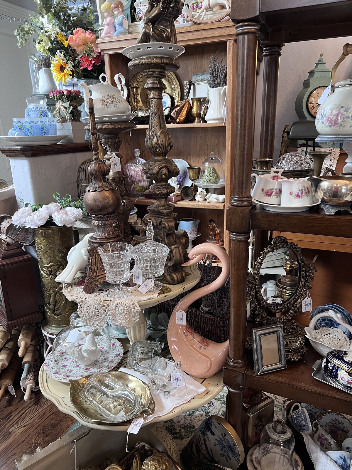 A curated shelf of vintage decor