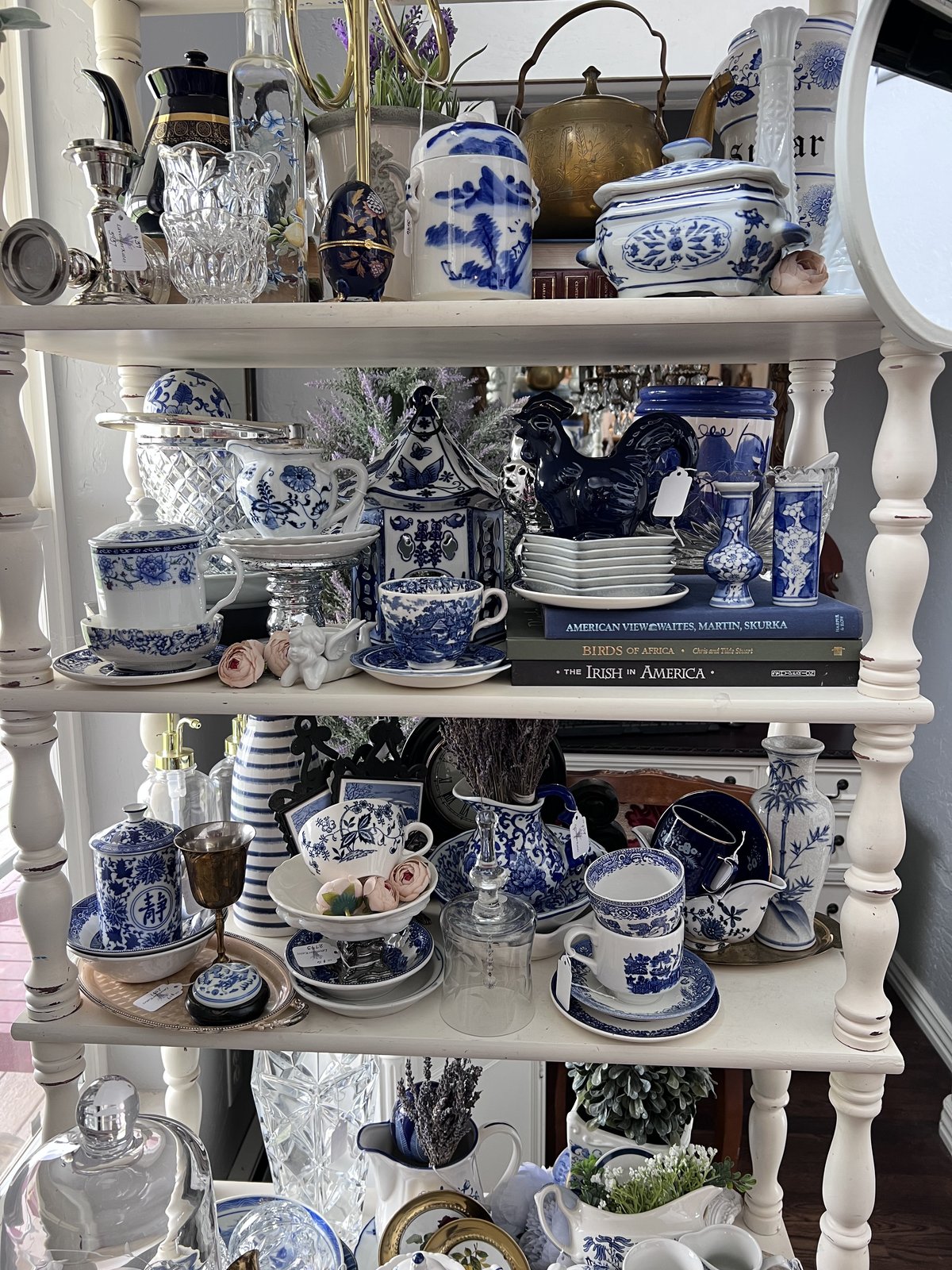 A curated corner of mirrors and frames