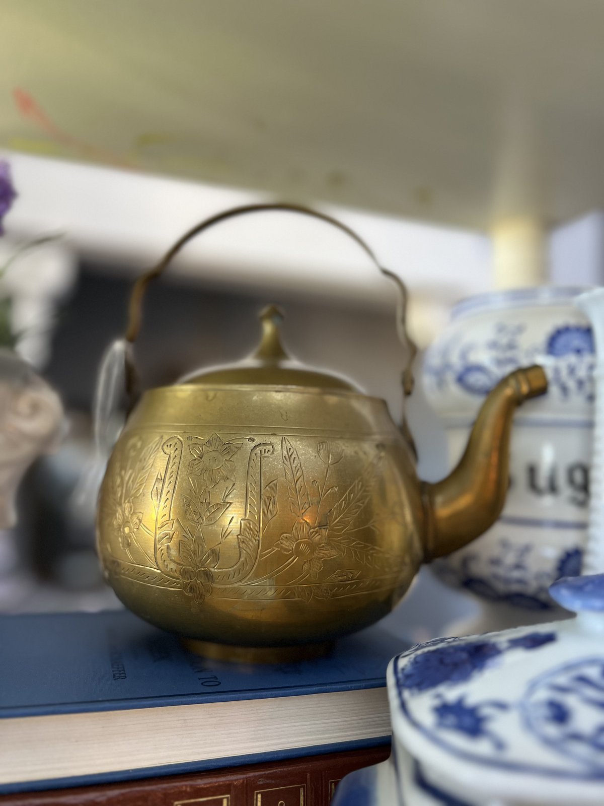 Hand-engraved brass kettle teapot with floral motifs