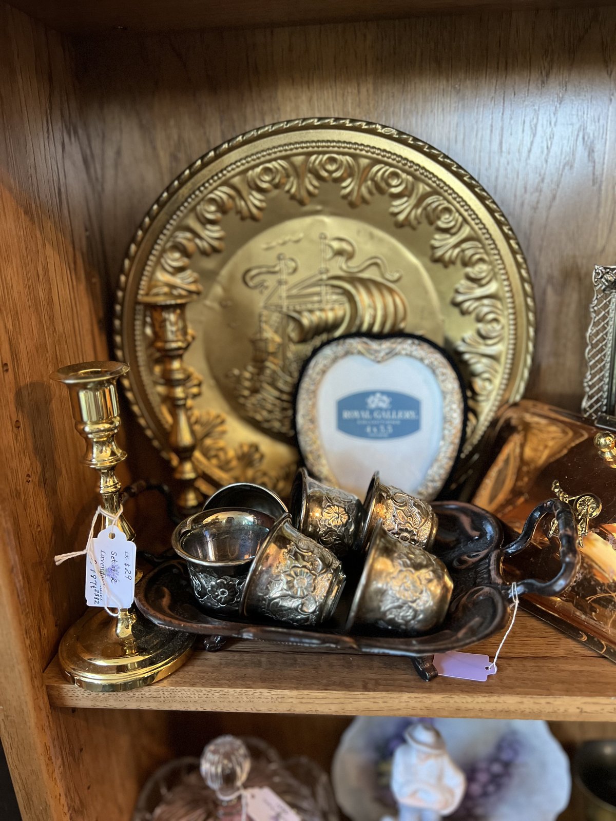 Embossed brass ship charger plate with silver filigree cups